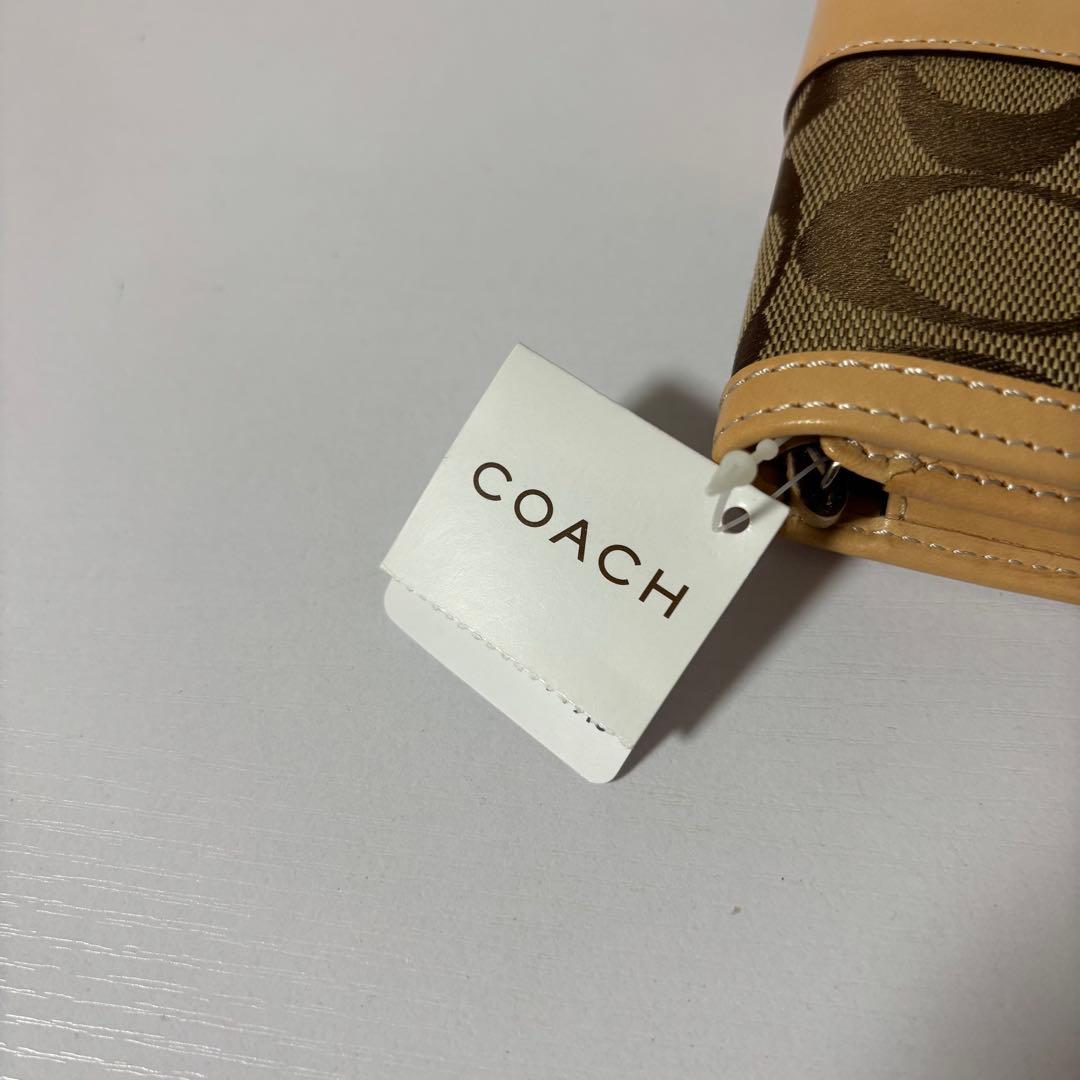 0074 新品、未使用 COACH シグネチャー レディース 折り財布