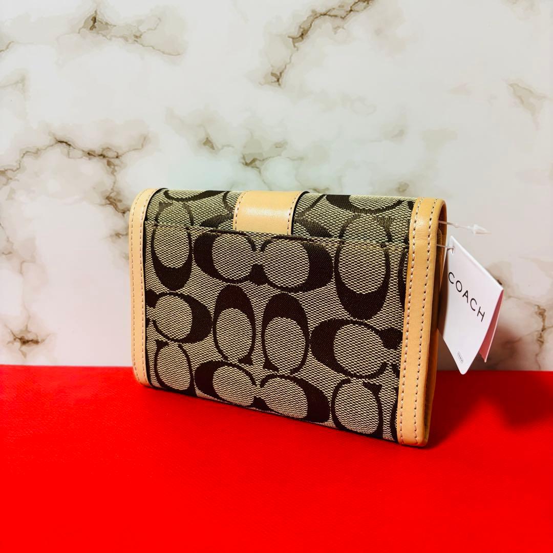 0074 新品、未使用 COACH シグネチャー レディース 折り財布