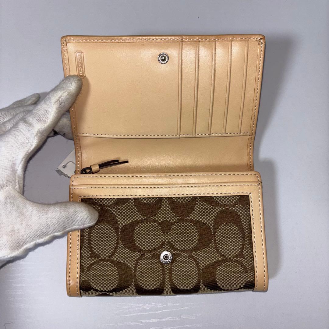 0074 新品、未使用 COACH シグネチャー レディース 折り財布